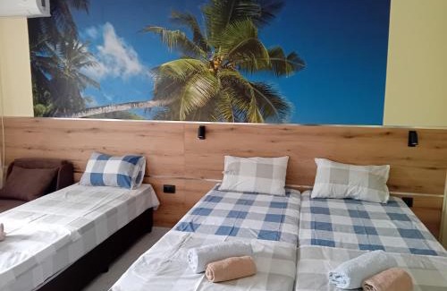 Kiten House | Pet-Friendly Guesthouse Oasis with Hot Tub & Breakfast