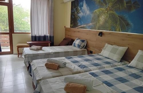 Kiten House | Pet-Friendly Guesthouse Oasis with Hot Tub & Breakfast