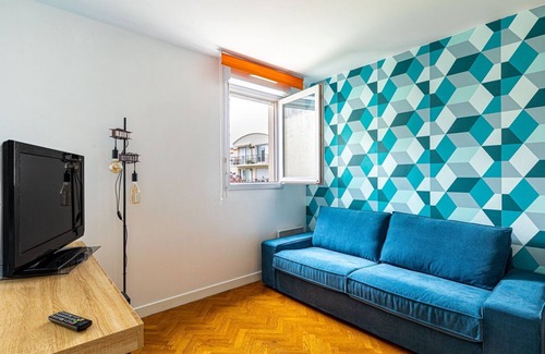 Asnieres-sur-Seine Apartment | Experience Blue Serenity at GuestReady in Asnières-sur-Seine