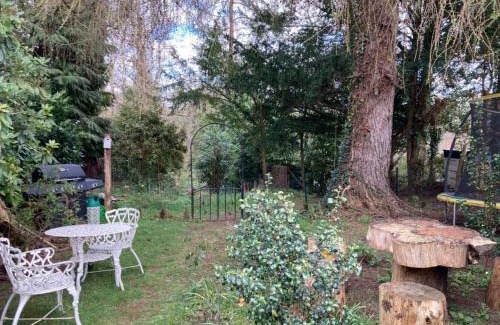 Bramley House | Enchanted Guildford Home with River Views & Woodland Garden