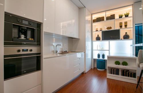 Guimaraes Apartment | Discover GuimaGold: 4-Star Stay with Family-Friendly Perks