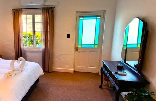 Knysna Bed & Breakfast | Discover Guinea Fowl Lodge: 4-Star Retreat with Pool