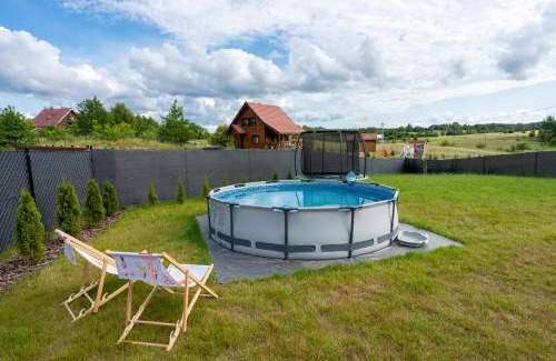 Morag House | Inviting Gulbity House: Pet-Friendly with Pool & Family Fun
