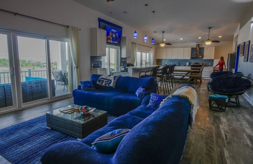 Navarre Beach House | Stunning Backyard Oasis with Pool, Hot Tub & Ocean Views