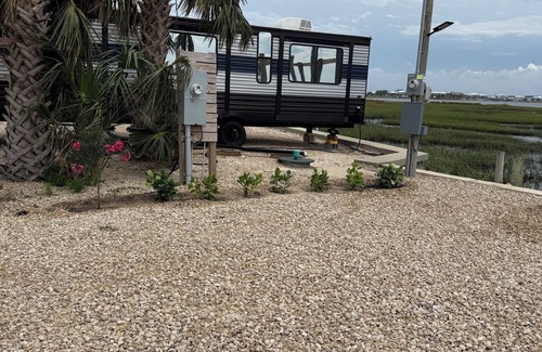 Keaton Beach RV Rental | Inviting Gulf Front RV Site with Deck and Eco-Friendly Amenities