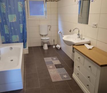 Manslagt Apartment | Discover Gulfhof Anelis: Eco-Friendly Retreat with Hot Tub