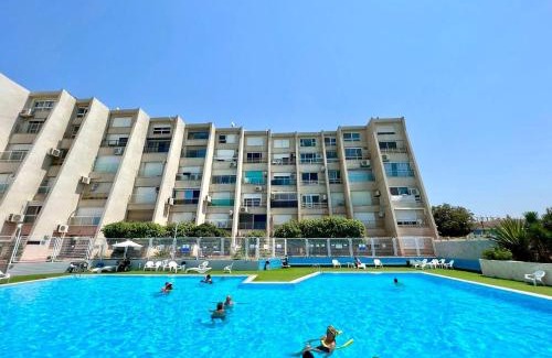 Nahariya Apartment | Gugel Waves Seaview Pool Apartments with Oceanfront Charm