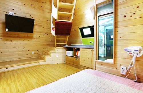Gyeongju House | Eco-Friendly Gyeongju Pyramid Pension with Family Amenities
