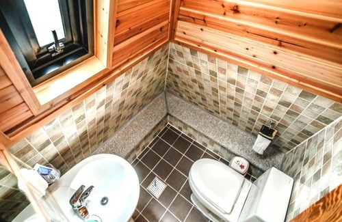 Gyeongju House | Eco-Friendly Gyeongju Pyramid Pension with Family Amenities