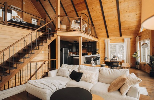 Saint-Joseph-de-la-Rive Ski Chalet | Relaxing Retreat at Chalet du Bois: Spa & Scenic Views