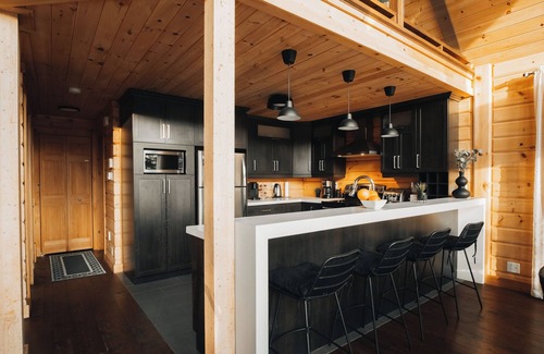 Saint-Joseph-de-la-Rive Ski Chalet | Relaxing Retreat at Chalet du Bois: Spa & Scenic Views