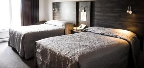 Amos Hotel | Budget-Friendly Hôtel Écono-One with Family Amenities