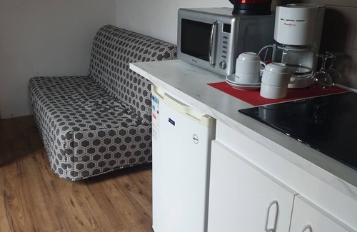 Saint-Amand-Montrond House | Discover Comfort at Hôtel de l'Ecu with Family-Friendly Amenities