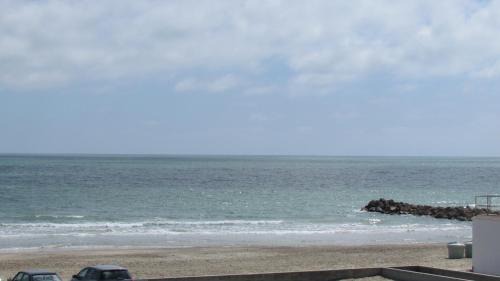 Palavas-les-Flots Hotel | Pet-Friendly Getaway at Hôtel du Midi Plage - Family Fun!