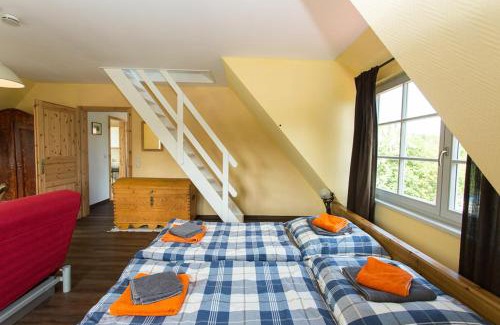Kloster Apartment | Hügelhus: Beachfront Retreat with Ocean Views & Family Fun