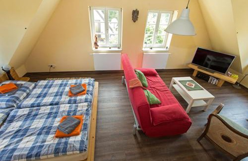 Kloster Apartment | Hügelhus: Beachfront Retreat with Ocean Views & Family Fun