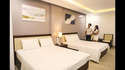 Sam Son Hotel | Relax at FLC Sầm Sơn: Pet-Friendly with Pool & Dining