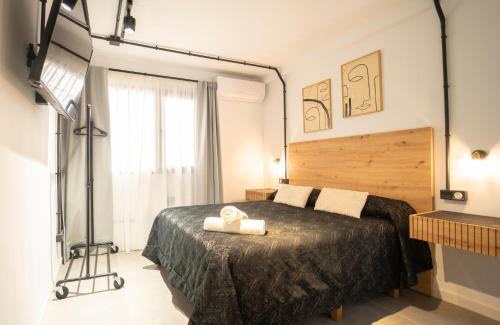 San Ildefonso Apartment | Family-Friendly H&H Suite Oasis in Scenic Granada