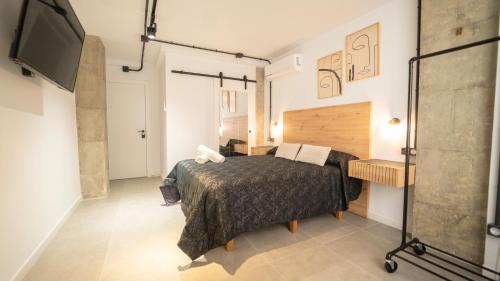 San Ildefonso Apartment | Family-Friendly H&H Suite Oasis in Scenic Granada