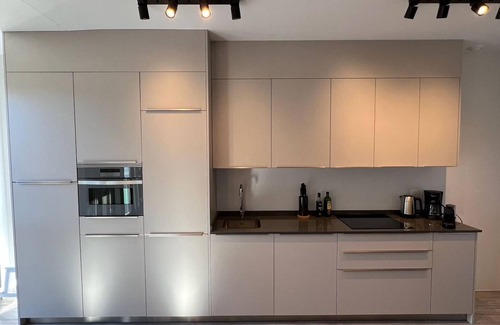 San Felipe Neri Apartment | Modern Poolside Retreat in Alta Downtown with Parking