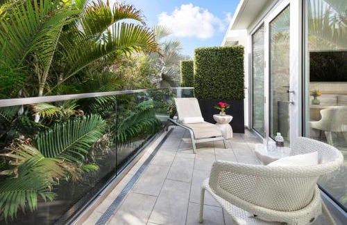 Uptown - Upper Duval Resort | Elegant H2O Suites for Adults: Poolside Oceanfront Retreat