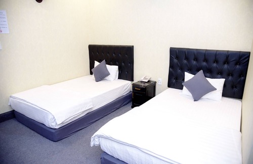 Bien Hoa Hotel | Discover Ha Trinh Hotel: Family-Friendly with Spa & Dining