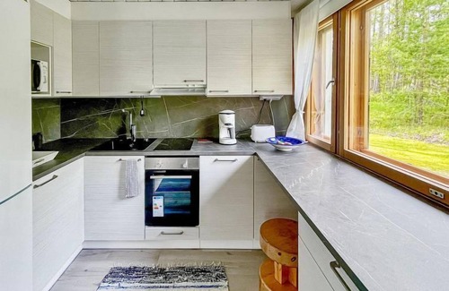 Posio House | Cozy Haapala by Interhome: Lake View & Spa Retreat