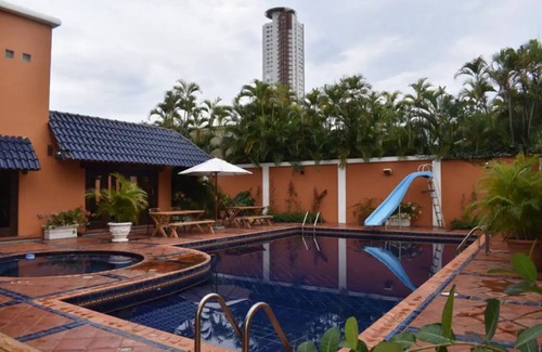Helios del Oeste Apartment | Relax at Hab. Maria Montez with Pool and Kitchen Amenities