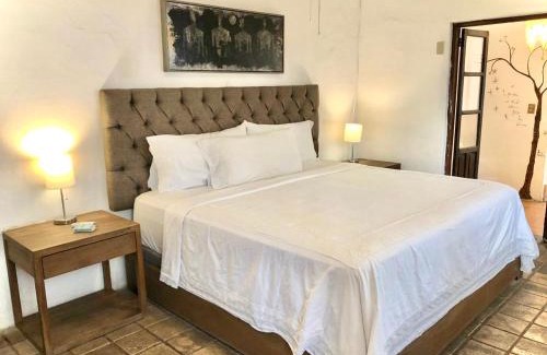 Esterito House | Prime Location: Room Steps from the Malecón with Ocean View