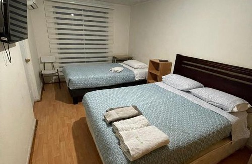 Talca House | Comfortable Room with AC - 2 Beds & Private Bath