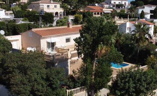 Pinar del Advocat Apartment | Cozy Room with Sloped Ceiling and Ocean View