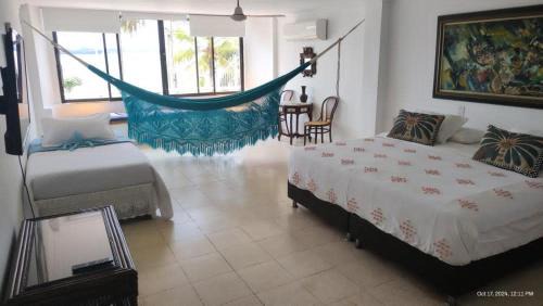 Castillogrande House | Oceanfront Getaway: Cozy Room at a Beautiful Seaside Home