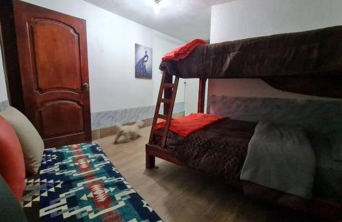 Papallacta Apartment | Inviting Room in Papallacta with Child-Friendly Amenities