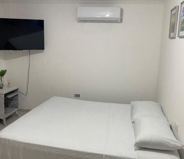 Crespo Apartment | Convenient Rooms Near the Airport with Family Amenities