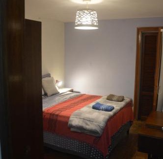 Salto House | Cozy Private Room "Norte" with Shared Bath in Trendy Hostel
