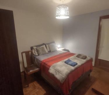 Salto House | Cozy Private Room "Norte" with Shared Bath in Trendy Hostel