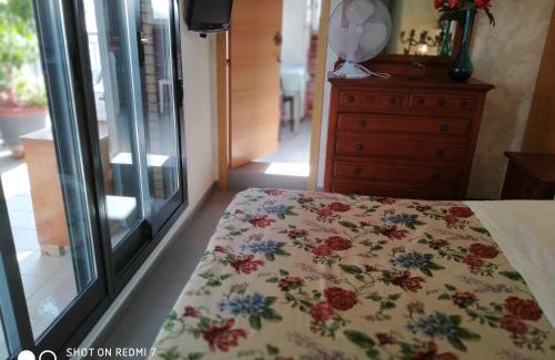 Burriana House | Seaside Attic Room with Large Terrace and Kitchen Access