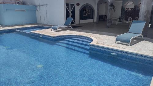 Downtown Cancun Hotel | Pet-Friendly Stay at Hacienda de Castilla with Pool & Hot Tub