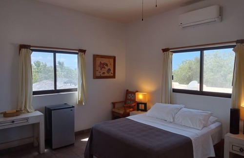 La Ribera Bed & Breakfast | Oceanfront Retreat: Hacienda de Palmas Room #4 with Pool