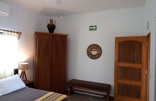 La Ribera Bed & Breakfast | Oceanfront Retreat: Hacienda de Palmas Room #4 with Pool