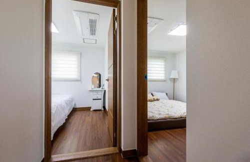 Pyoseon House | Relax at Haevichi Private Pension with Ocean Views & Pool