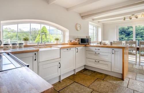 Trehafod House | Discover Hafod Ganol Farm: Family-Friendly Retreat with Hot Tub