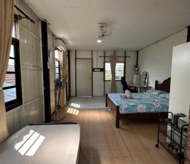 Kampung Padang Midin House | Exceptional Haji Othman Farm: Child-Friendly Retreat
