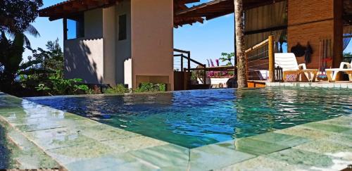 Prumirim House | Pet-Friendly Prumirim Guest House with Pool & Accessibility