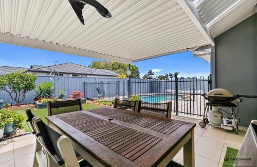 Banksia Beach House | Explore Halcyon House: Family-Friendly Oasis with Pool