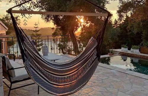 Lakka House | Elegant Hammock House with Oceanfront Pool & Child-Friendly Access