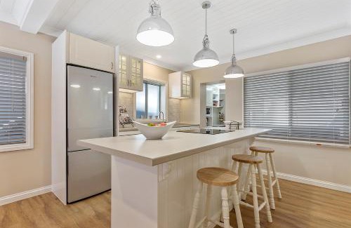 Deception Bay House | Oceanfront Escape at Hamptons at The Bay - Rated 9/10