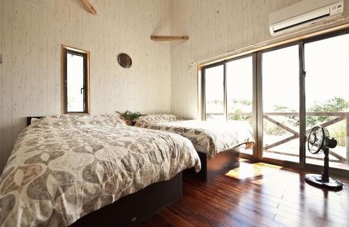 Maeganeku Apartment | Experience Hanare AOZORA: Family-Friendly with Pool Access