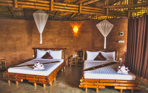 Stueng Trang Resort | Family-Friendly Hanchey Bamboo Resort with Pool & Dining