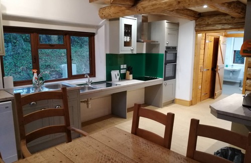 West Buckland Cabin | Tranquil Log Cabin with Hot Tub in Somerset's Scenic Valley